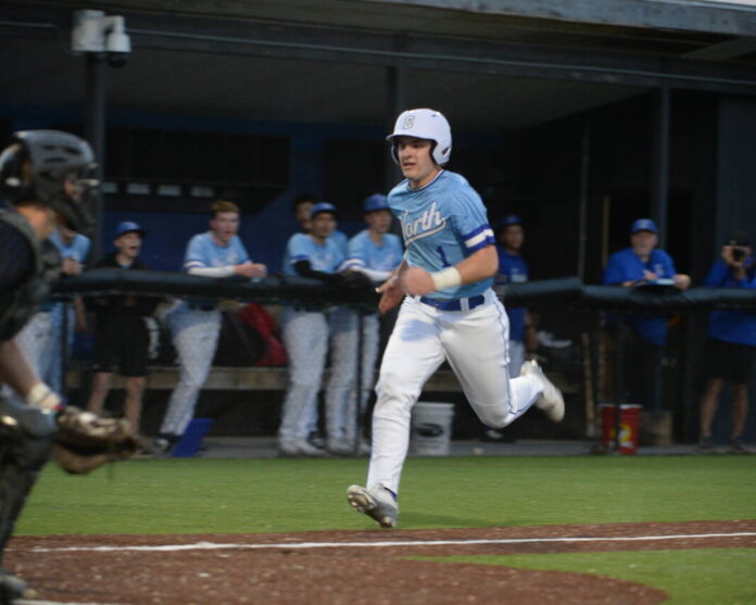136244738_web1_20260327cr-north-baseball-021