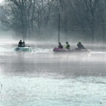 First responders rescue man, children from car in flooded Tellman Road