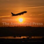 American Airlines and Google say AI helped airplanes reduce contrails that trap heat