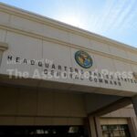 Brother and sister are charged after an explosive device was found outside a Florida Air Force base