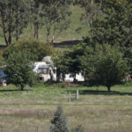 Australian police fatally shoot a suspect in a 3-hour standoff after 2 officers killed