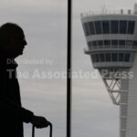 Some wait times at airport bottlenecks are easing with TSA paychecks promised