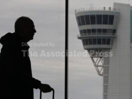 Some wait times at airport bottlenecks are easing with TSA paychecks promised