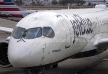 JetBlue raises its checked bag fees by as much as $9 as the Iran war affects fuel costs