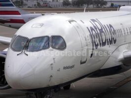 JetBlue raises its checked bag fees by as much as $9 as the Iran war affects fuel costs