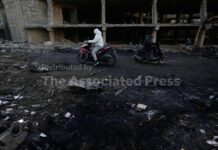 Iran hits tanker off coast of Qatar, Kuwait airport and Israel kills 5 in Beirut attack