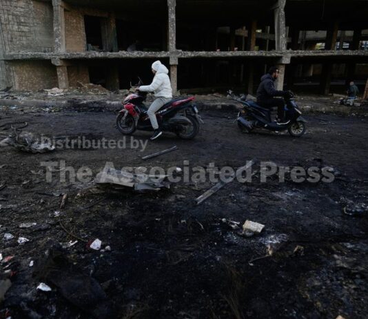 Iran hits tanker off coast of Qatar, Kuwait airport and Israel kills 5 in Beirut attack