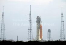 NASA begins fueling rocket to launch astronauts on the first lunar trip in half a century